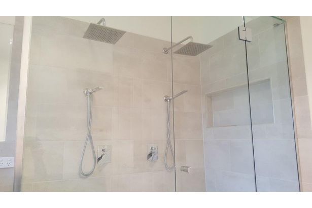 Newly renovated shower room with glass door